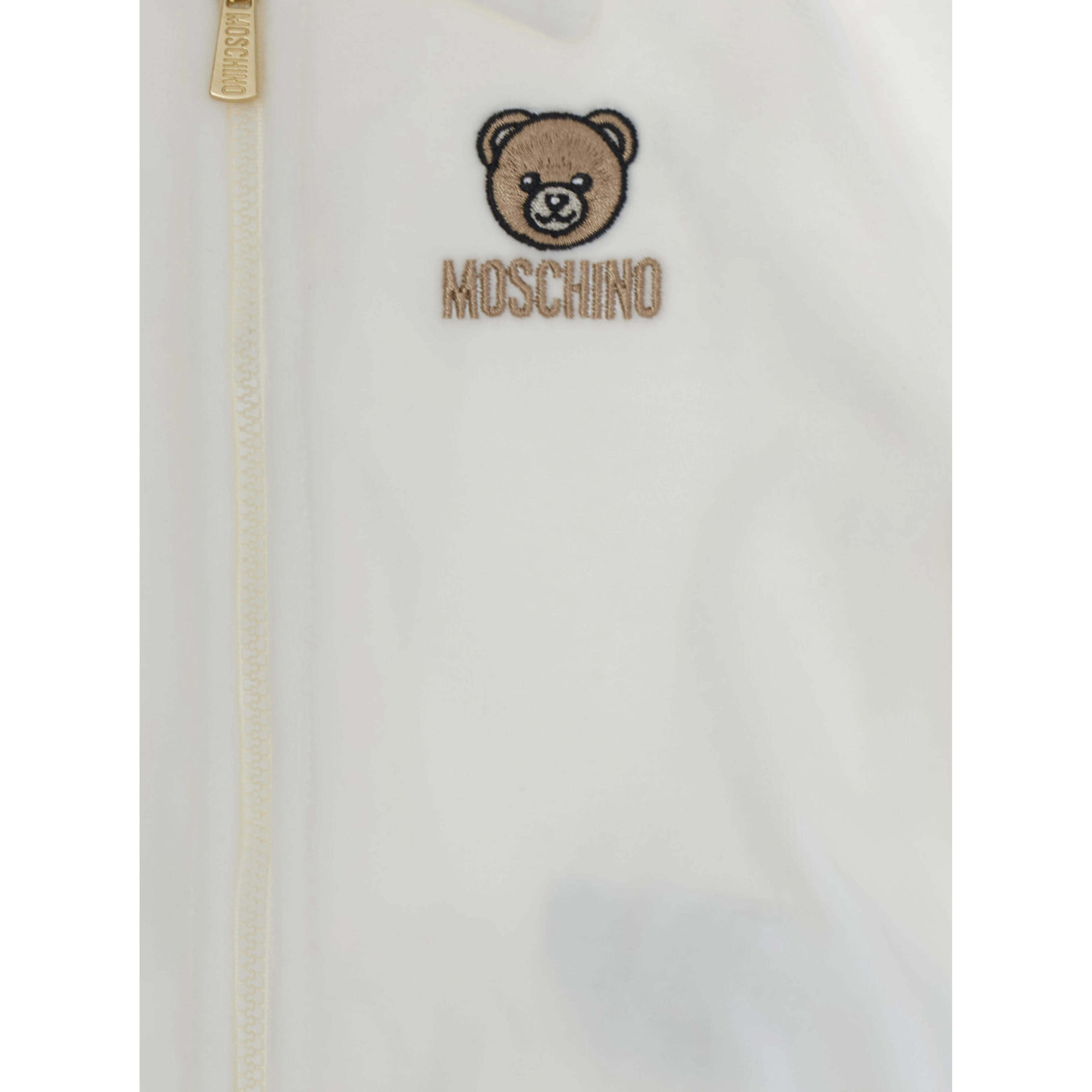 White Tracksuit with logo patch on front and elasticated hems in cotton bend baby