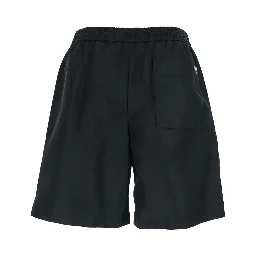 Black Shorts with Elastic Waist and AMI de Coeur Detail on the Back in Tech Fabric Man