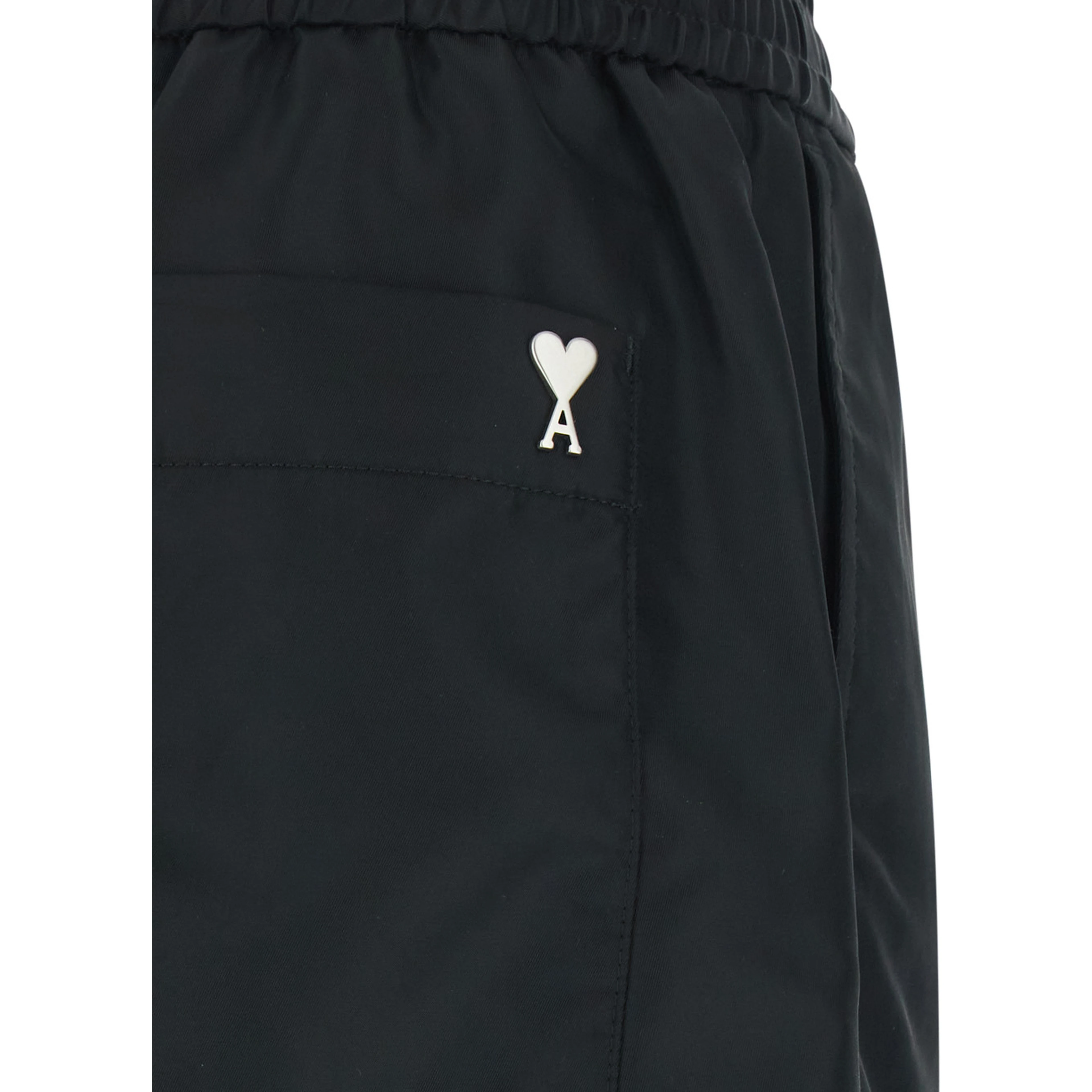Black Shorts with Elastic Waist and AMI de Coeur Detail on the Back in Tech Fabric Man