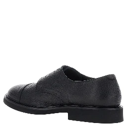 black Loafers with double buckle and round toe in hammered leather for men
