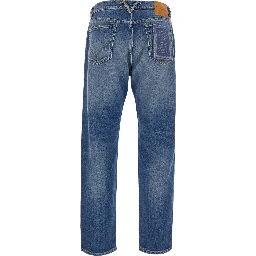 Blue Jeans with logo patch on the back and faded design in denim for men