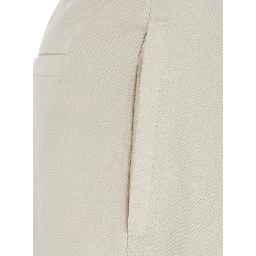 Beige pants with front pleats and Monile at the back in cotton blend for women