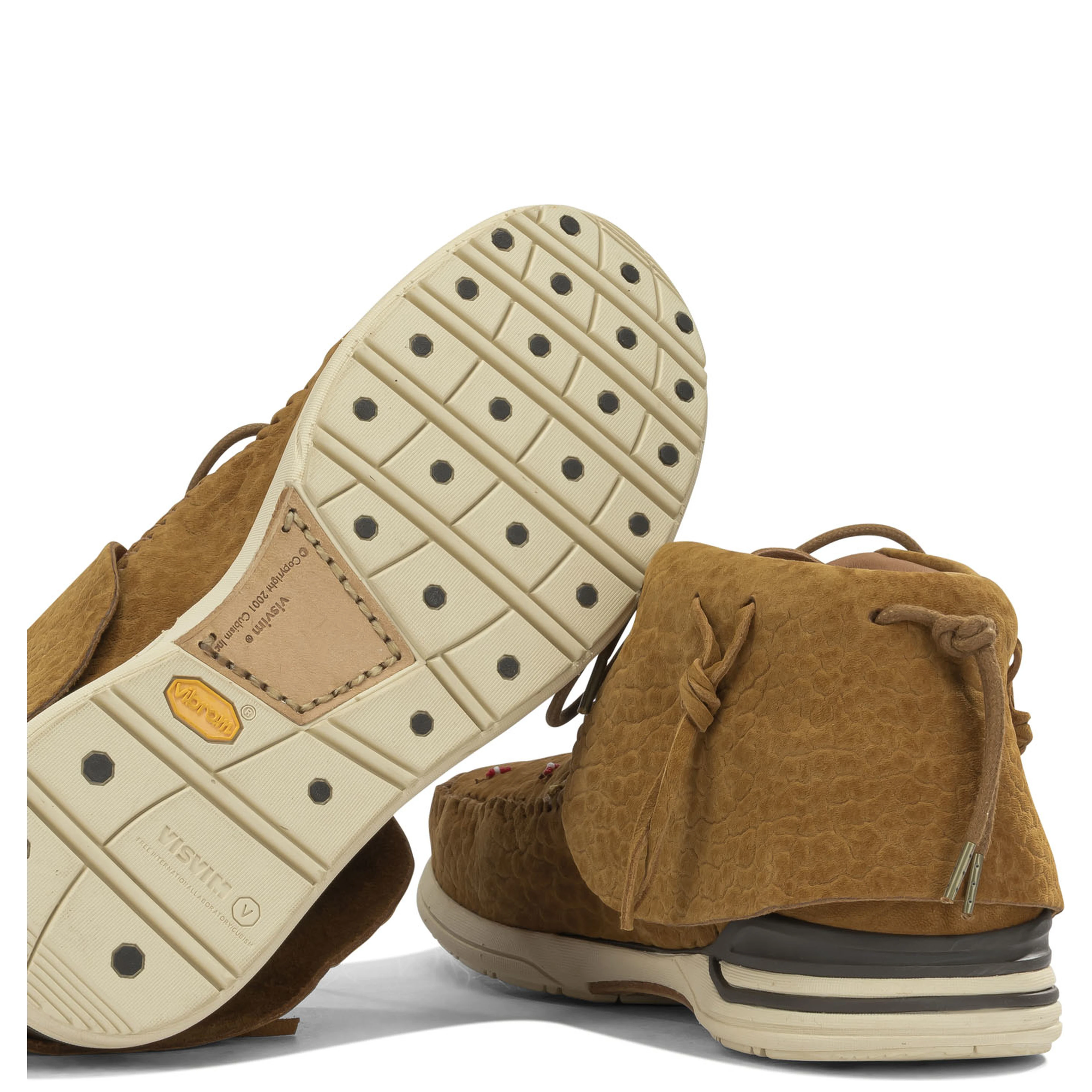 "Lhamo Folk" lace-up boots.