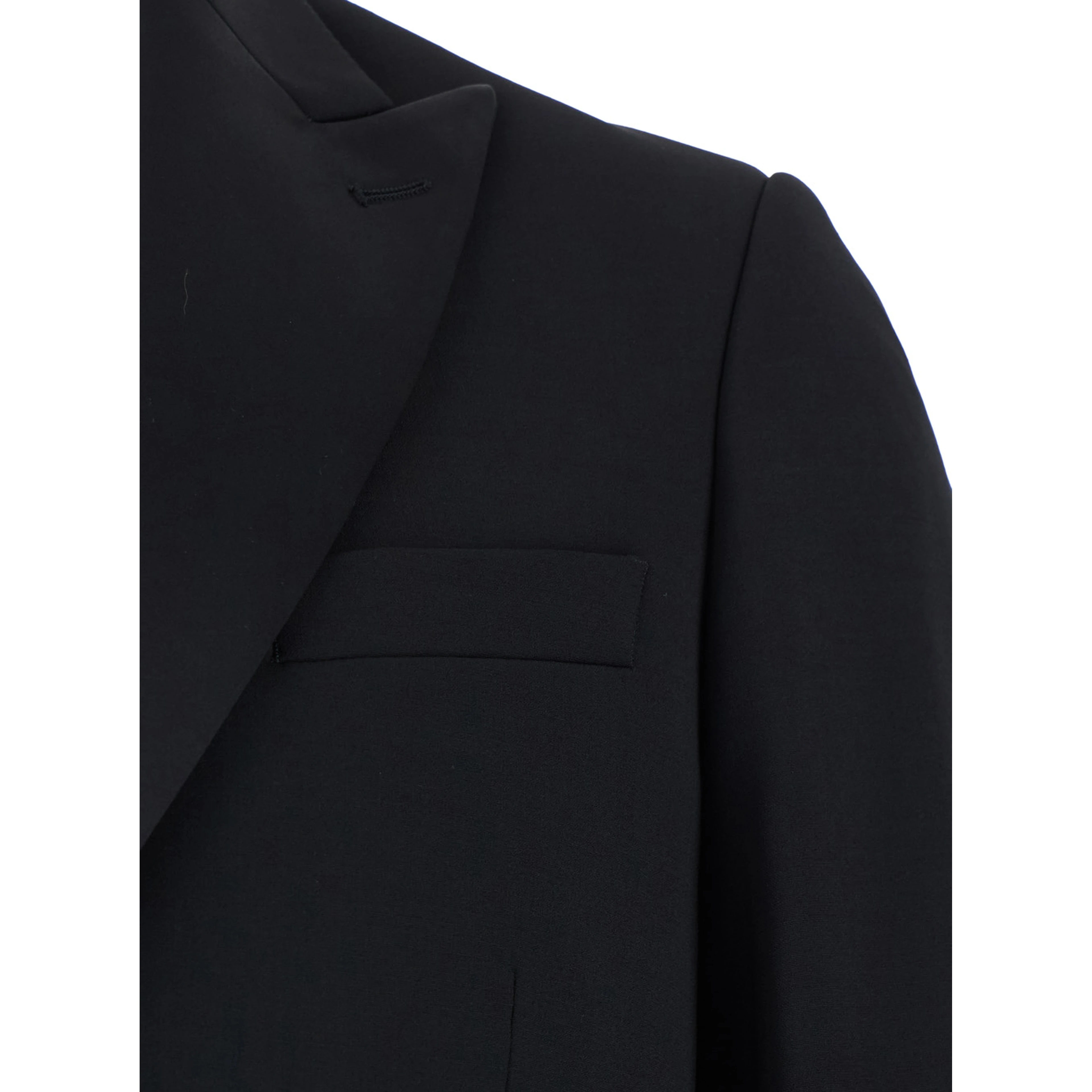 Single-breasted suit with peak revers in black fabric and long sleeve jacket for men