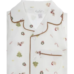 white romper with notch lapel collar and all-over print in cotton baby