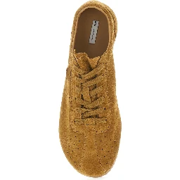 brown sneakers with perforated design and embossed logo on the back in suede man