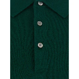 POLO NECK MERINO CASHMERE is a high-neck sweater with long sleeves in black wool and cashmere for women