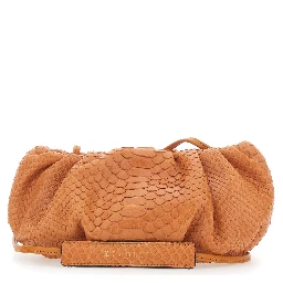 Pillow Orange Clutch with shoulder strap and magnetic closure in leather for women