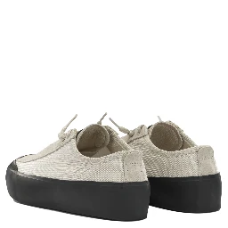 Sneakers in mixed leather and fabric