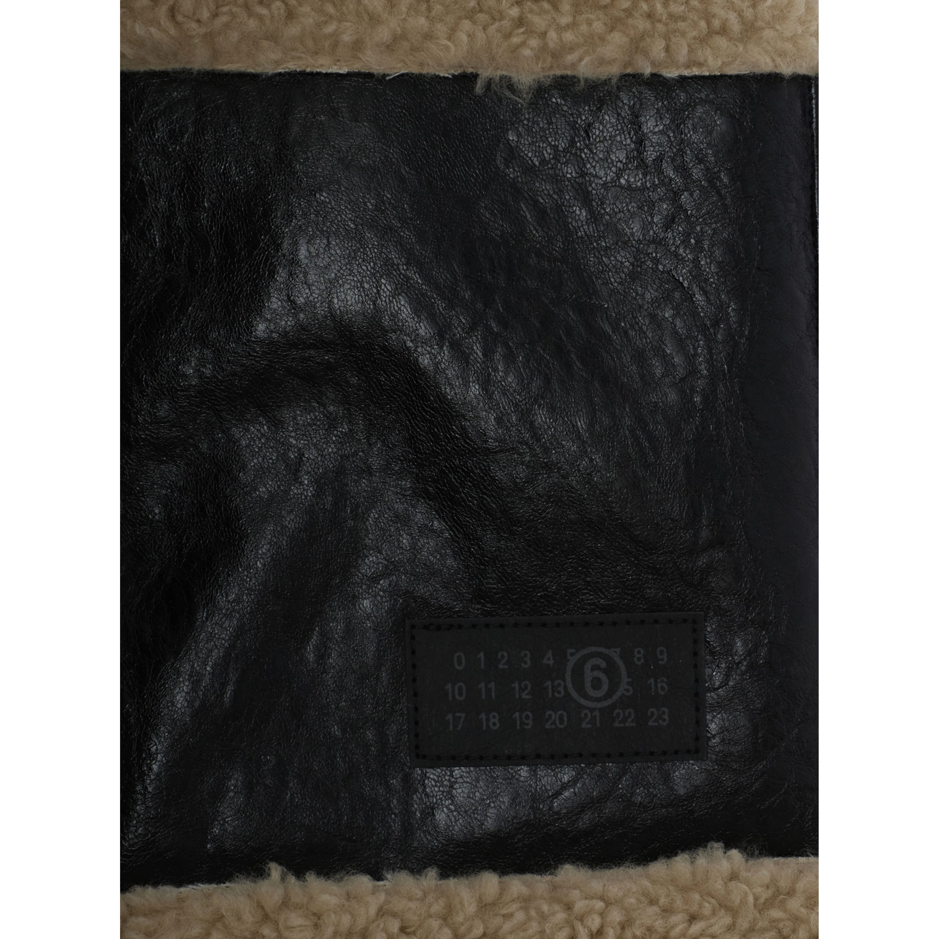 Jacket MM6 MAISON MARGIELA KIDS with patch and front closure in Tech Fabric Black Girl