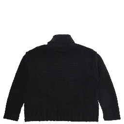 M61048MM08VMM6K62UM6900 is a sweater with a crew neck and long sleeves in black wool and nylon for boy