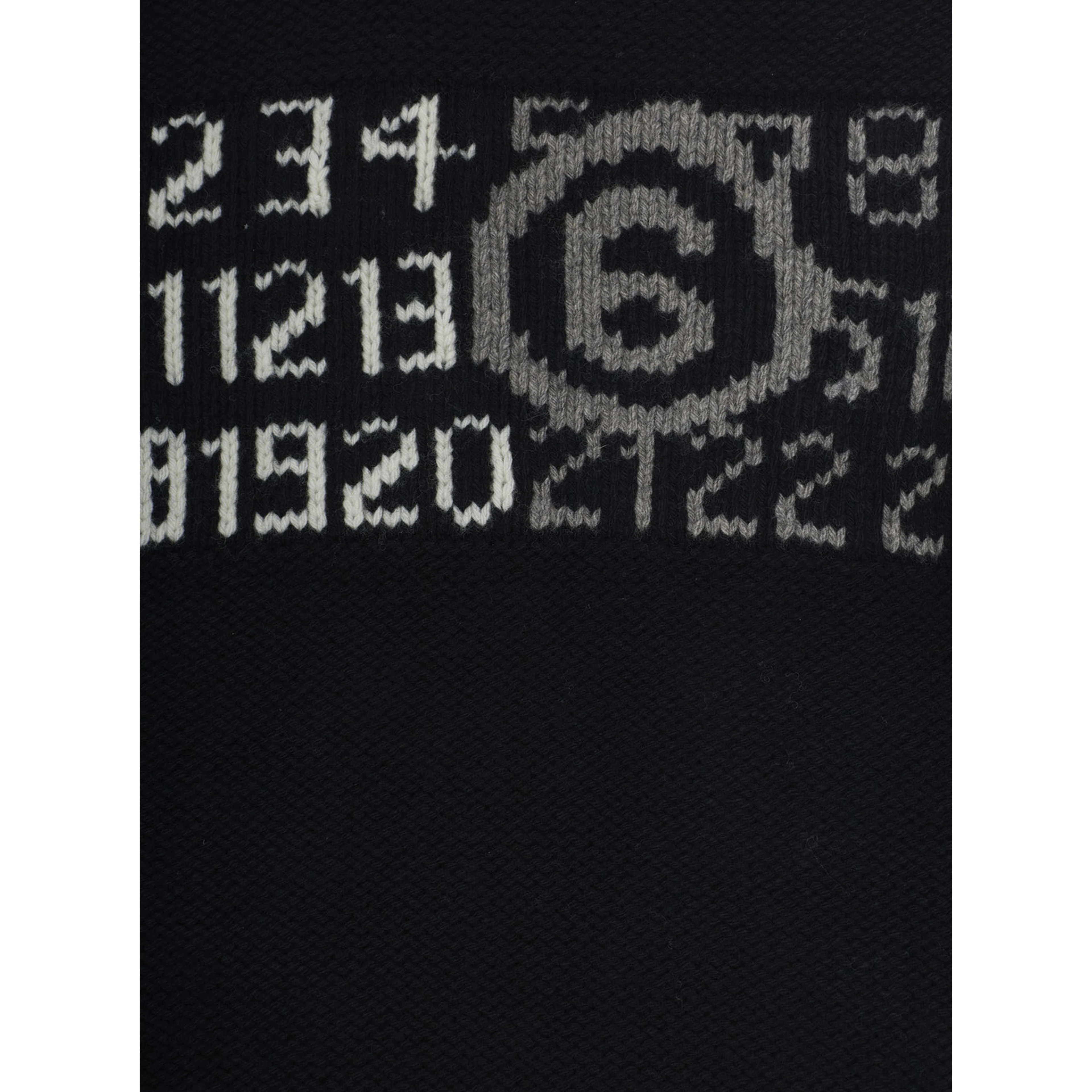 M61048MM08VMM6K62UM6900 is a sweater with a crew neck and long sleeves in black wool and nylon for boy