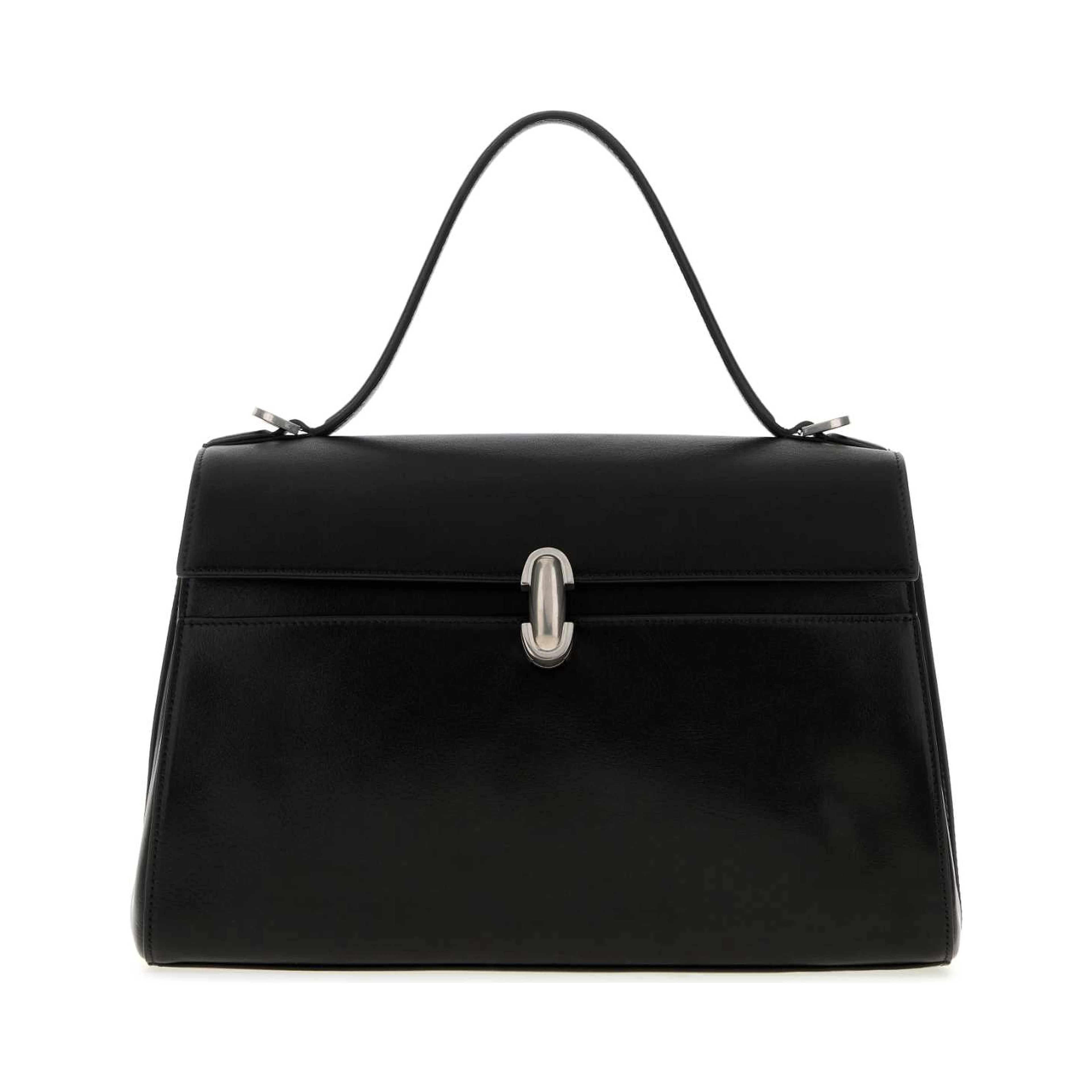 SOFT SYMMETRY IN VINTAGE CALF LEATHER