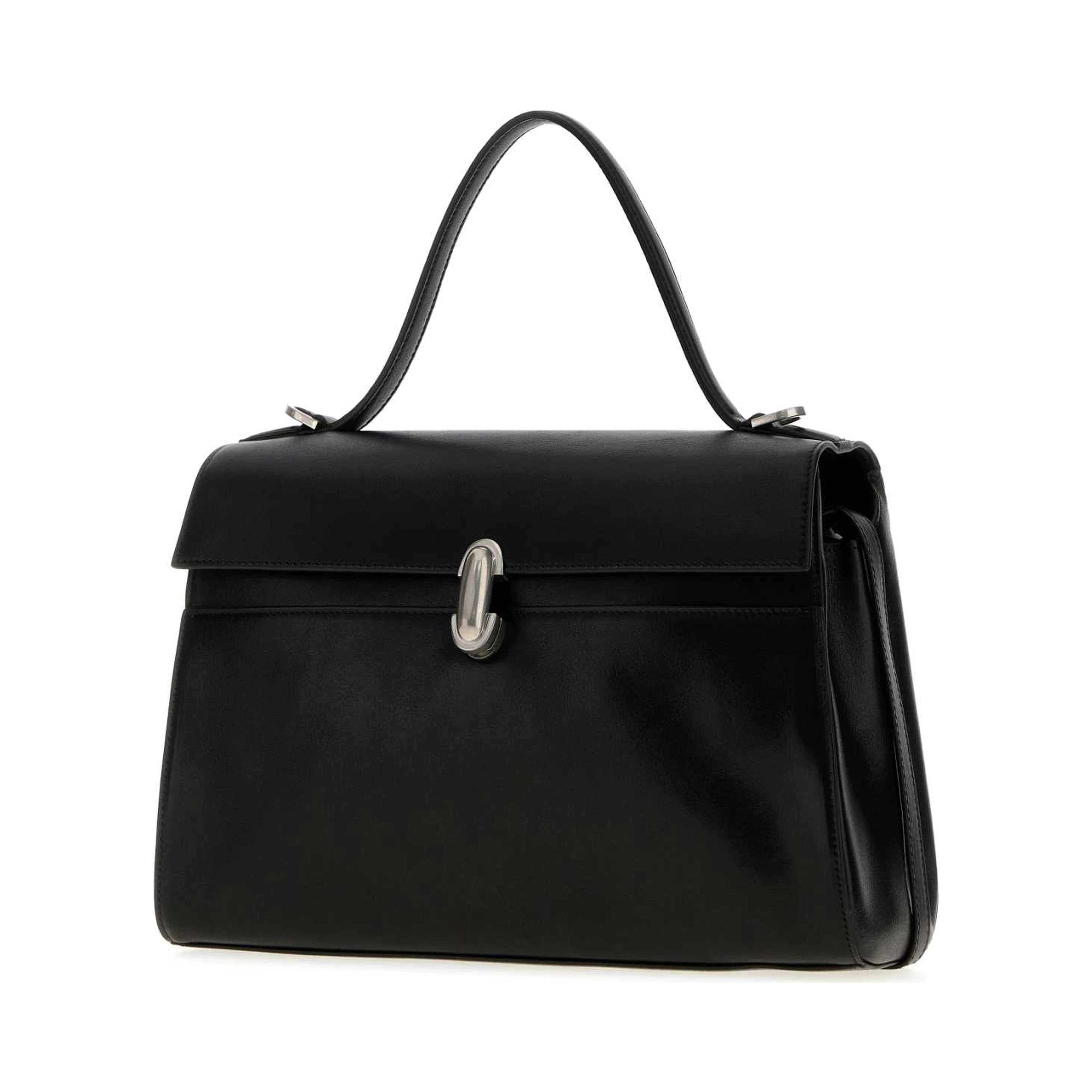SOFT SYMMETRY IN VINTAGE CALF LEATHER