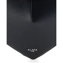 Shoulder bag with leather finishes and zip closure in black for women