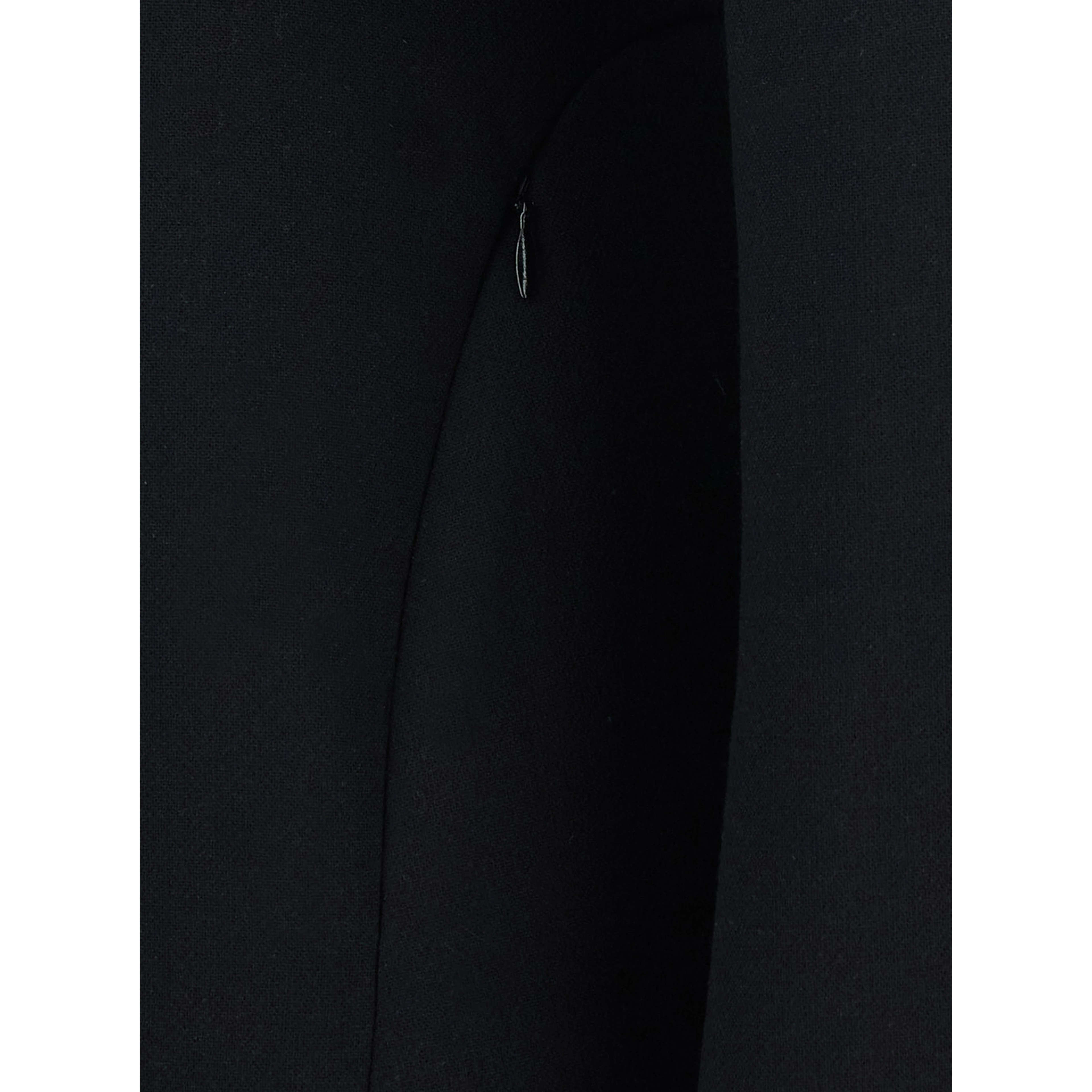 Coat with lapel collar, featuring long sleeves and front button closure. Made of wool, black, womens.