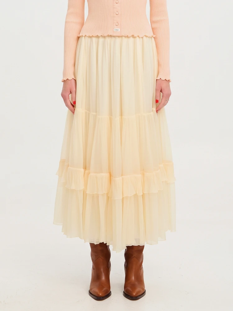 Long skirt with silk muslin ruffle