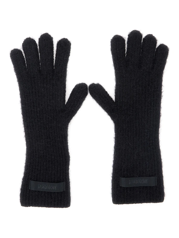LES GANTS GROS GRAIN are gloves characterized by a composition of black alpaca wool, nylon, and merino wool for women