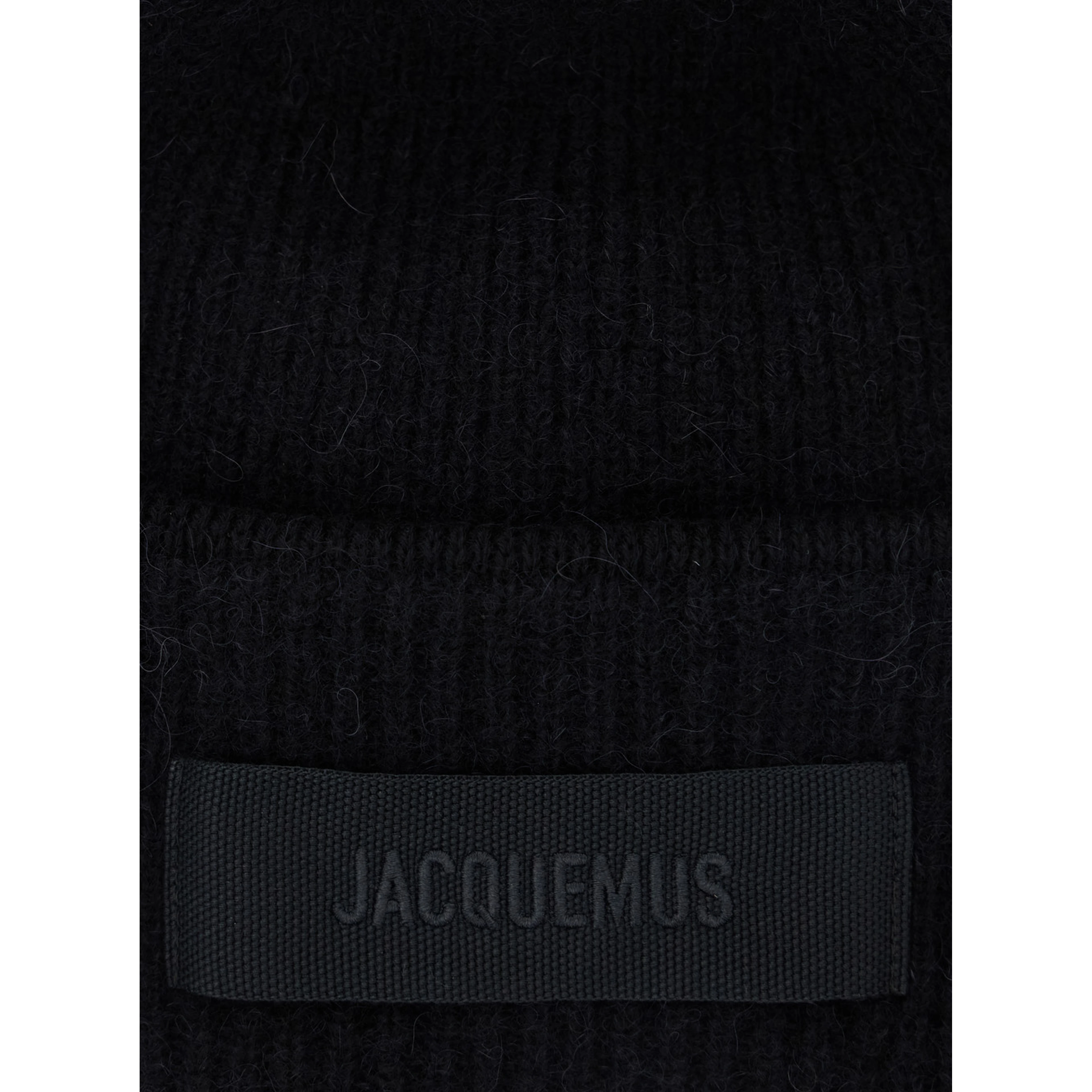 LE BONNET GROS GRAIN is a hat with a gros grain brim made of black unisex alpaca, nylon, and merino wool