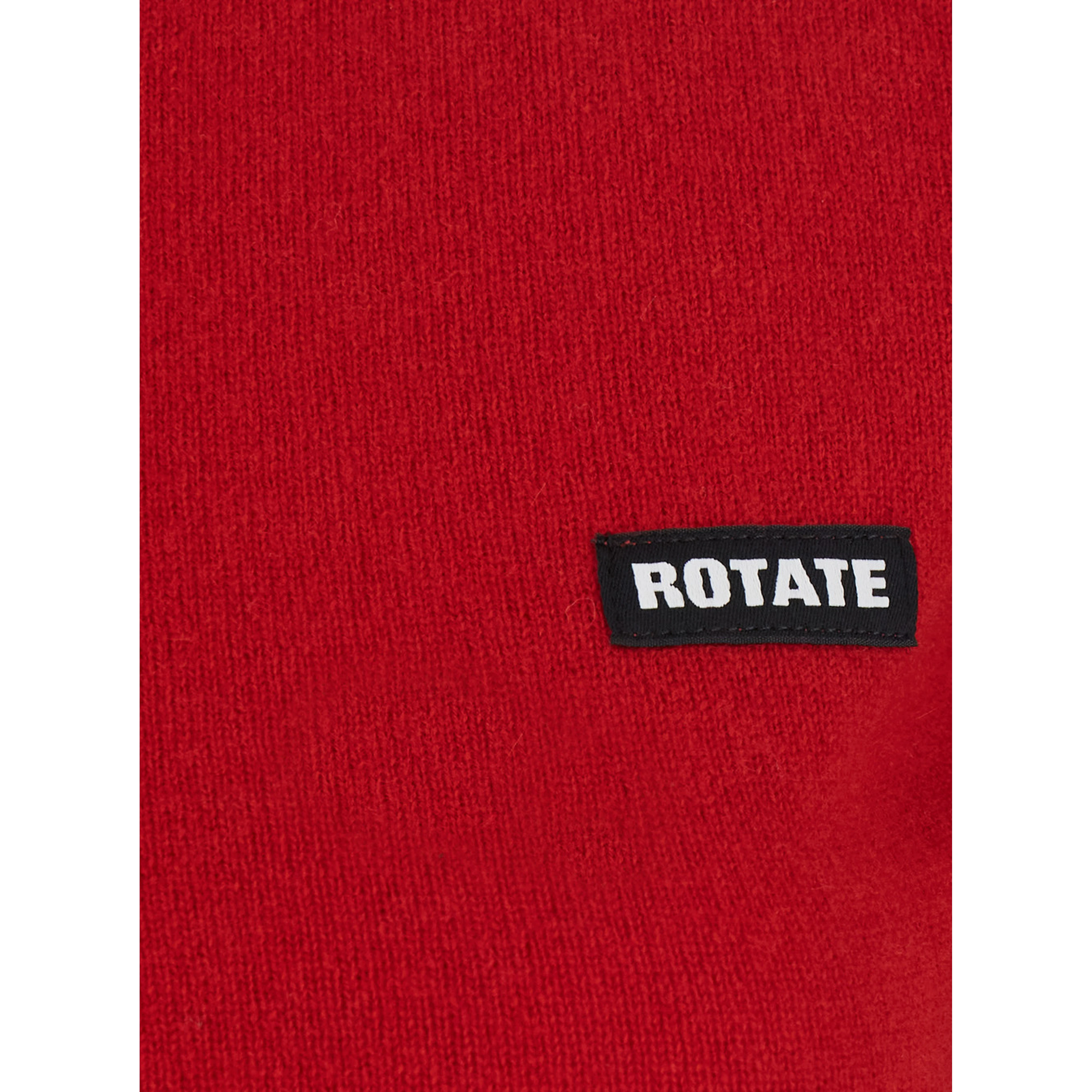 WOOL LONGSLEEVES POLO is a long-sleeve shirt made of merino wool and cashmere in red for women