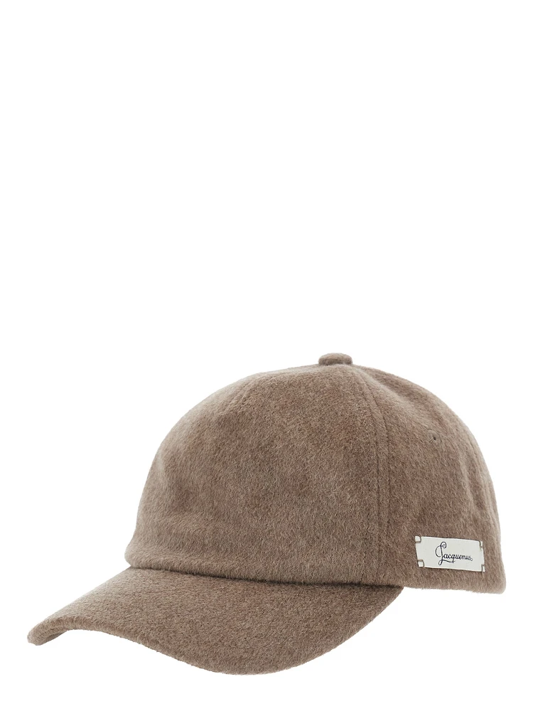 THE HORSEBIT CAP is a cotton visor hat in brown for unisex