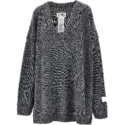 Inside-out knit oversized sweater