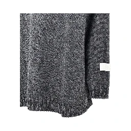 Inside-out knit oversized sweater