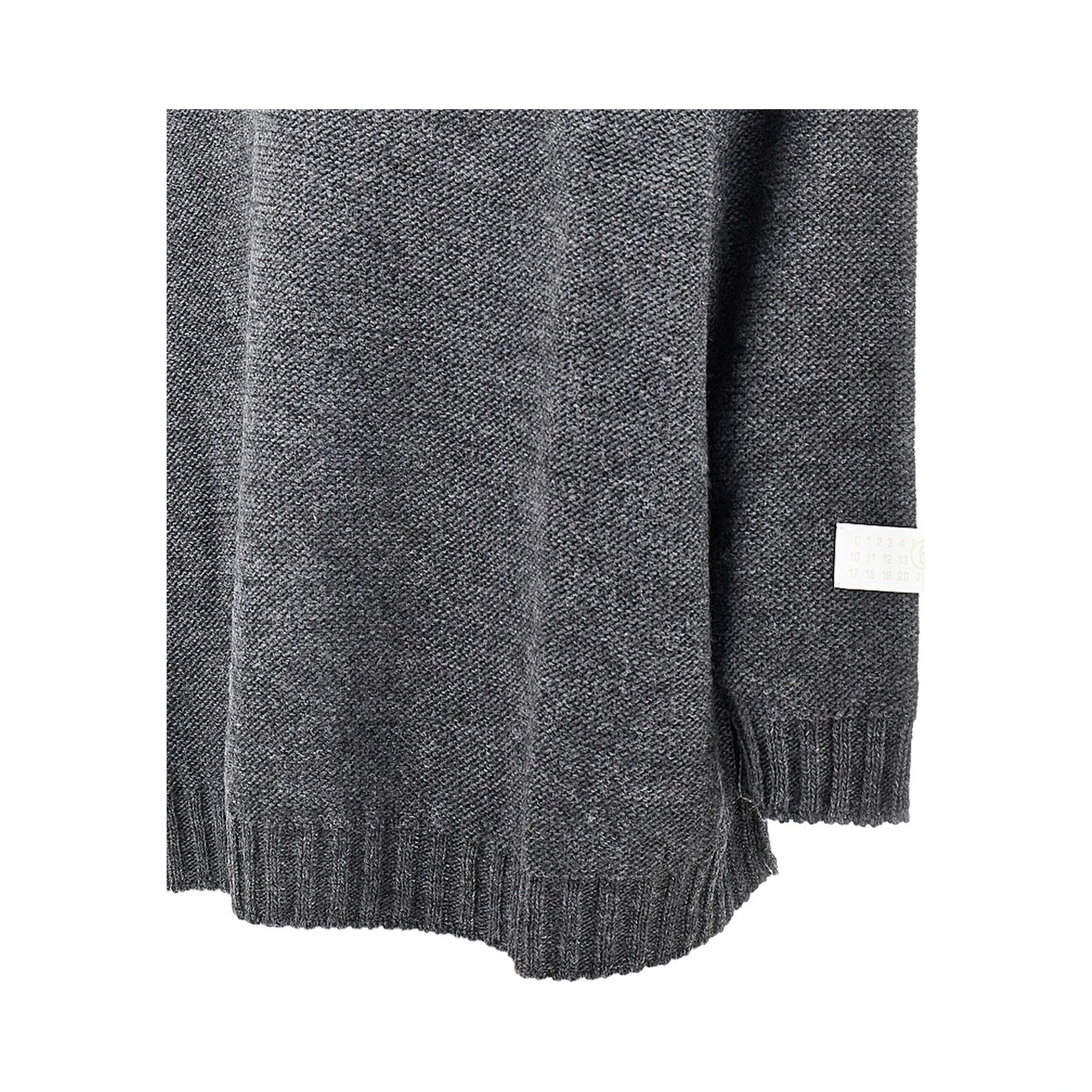 Inside-out knit oversized sweater