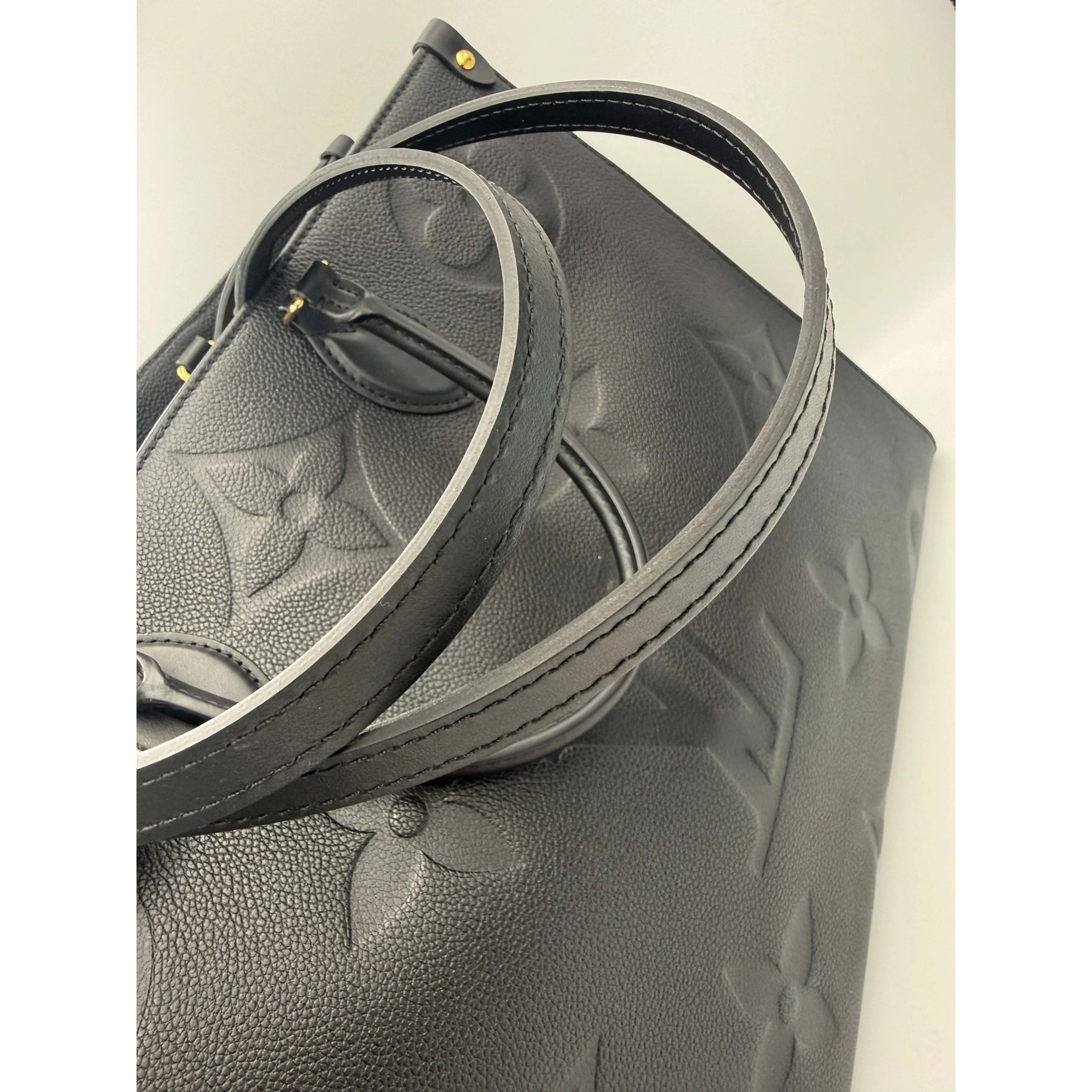 LOUIS VUITTON ON THE GO Empreinte GM Handbag