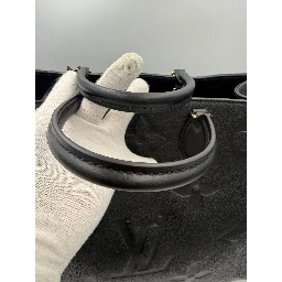 LOUIS VUITTON ON THE GO Empreinte GM Handbag